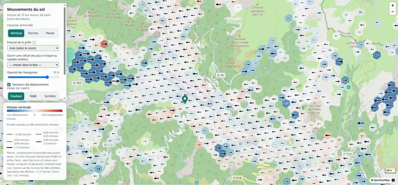 Carte d'un disque de 25 km couvert de très petits hexagones, majoritairement bleus, avec des flèches est-ouest, au niveau de grille r9.